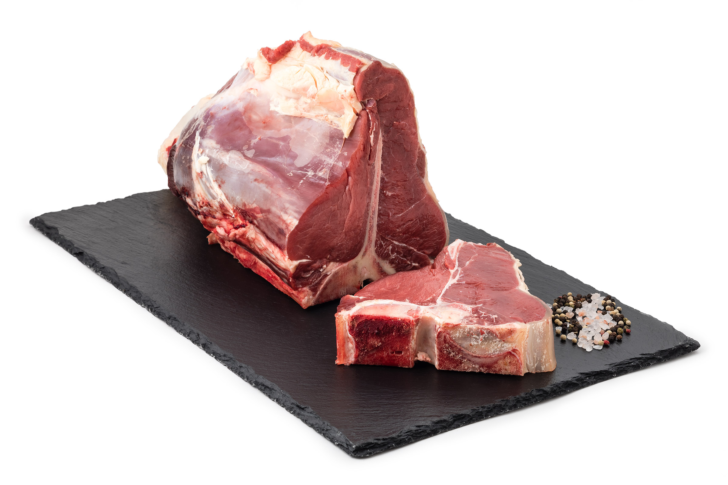 Rohes T-Bone-Steak auf Platte