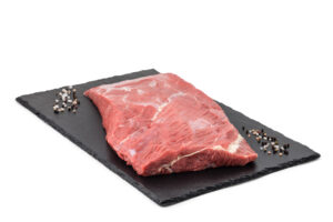 Bio Rinderbrustkern Rohes Rindfleisch auf schwarzem Teller