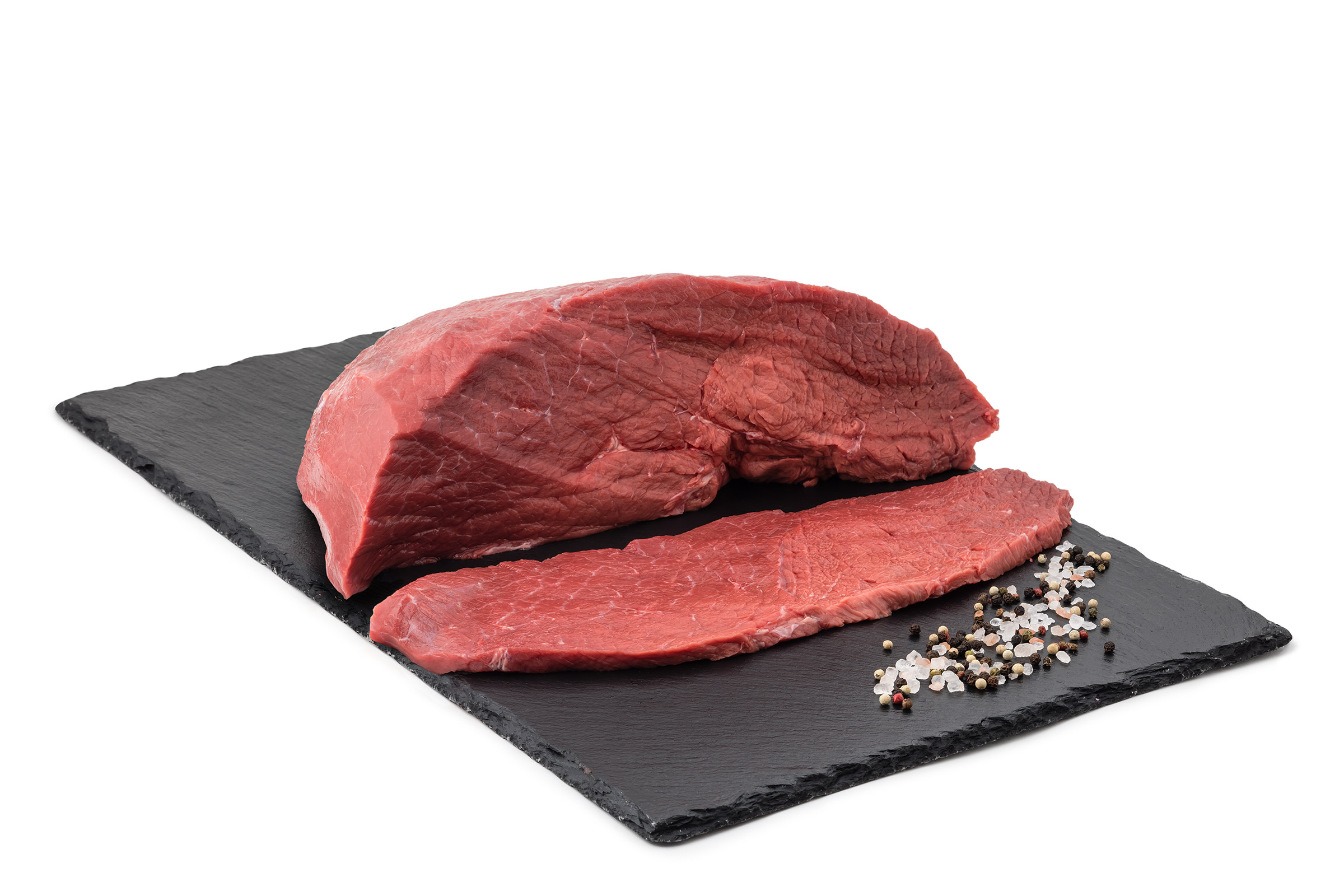 Rohes Rindfleisch auf schwarzem Stein